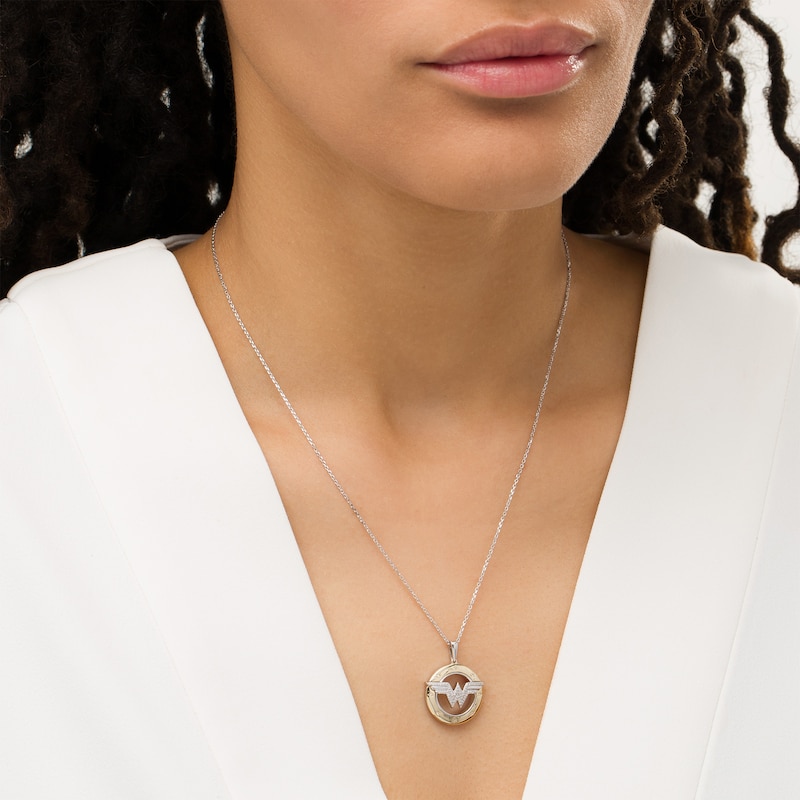 1/10 CT. T.W. Diamond Symbol Circle Pendant in Sterling Silver and 10K Gold